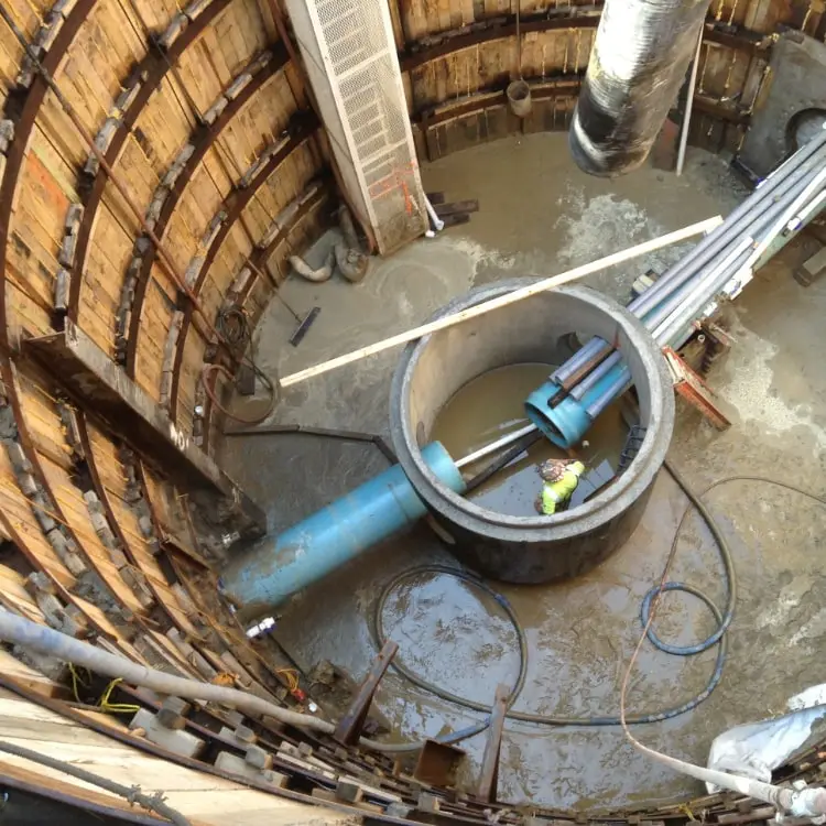 Elastizell Systems worker injecting lightweight cellular concrete for an annular pipeline fill